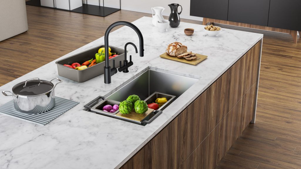 Franke Cube sink with Eos Neo Faucet and the All in Accessory system in a kitchen island